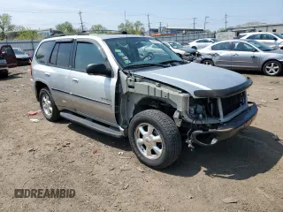 2006 GMC Envoy SLE z VIN 1GKDT13S662171123, wystawiony jako Copart lot #56418255 z przebiegiem 106 777 mil mil oraz Szkoda całkowita • Salvage title. Historia ofert i sprzedaży dostępna na DreamBid. Obrazek 4.
