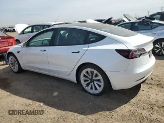 2021 Tesla Model 3 Standard Range Plus z VIN 5YJ3E1EA6MF059194, wystawiony jako Copart lot #53483595 z przebiegiem 22 072 mil mil oraz Szkody całkowita. Historia ofert i sprzedaży dostępna na DreamBid. Obrazek 2.