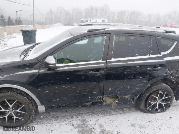2017 Toyota RAV4 SE with VIN 2T3JFREV5HW591932, listed as a IAAI auction lot 41628183 with 142,599 mi miles. Bid and sale history available at carsss.com. Image 14.