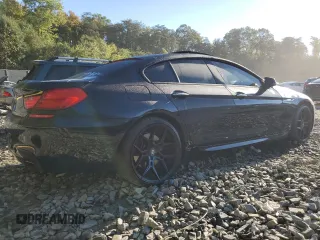 2014 BMW 6 Series 650i xDrive z VIN WBA6B4C54ED371520, wystawiony jako Copart lot #75107784 z przebiegiem 136 077 mil mil oraz Szkoda całkowita • Salvage title. Historia ofert i sprzedaży dostępna na DreamBid. Obrazek 3.