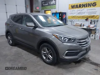 2018 Hyundai Santa Fe 2.4L z VIN 5XYZTDLBXJG568044, wystawiony jako IAAI lot #41116830 z przebiegiem 94 488 mil mil oraz . Historia ofert i sprzedaży dostępna na DreamBid. Obrazek 1.