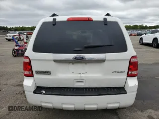 2011 Ford Escape Hybrid with VIN 1FMCU4K30BKB66313, listed as a Copart auction lot 58771165 with 297,214 mi miles and Salvage title. Bid and sale history available at DreamBid. Image 6.