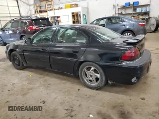 2003 Pontiac Grand Am GT with VIN 1G2NW52EX3M579719, listed as a Copart auction lot 49891365 with 153,838 mi miles and Salvage Title. Bid and sale history available at carsss.com. Image 2.