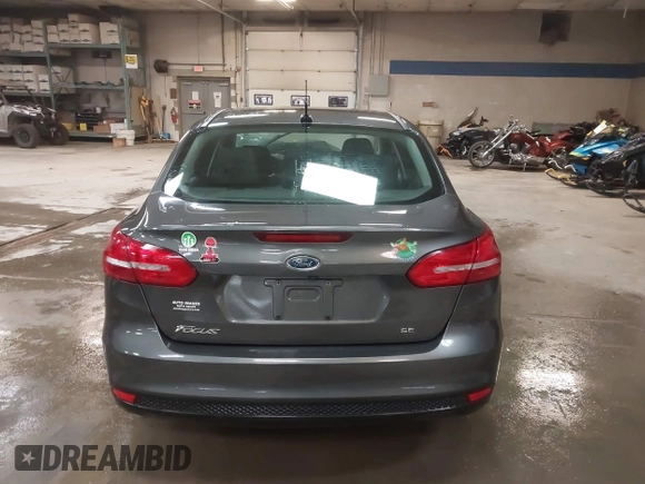2016 Ford Focus SE with VIN 1FADP3F21GL247906, listed as a IAAI auction lot 42043546 with 124,532 mi miles and . Bid and sale history available at DreamBid. Image 16.