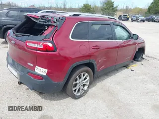 2014 Jeep Cherokee Latitude with VIN 1C4PJLCS3EW143362, listed as a IAAI auction lot 42150037 with 86,012 mi miles. Bid and sale history available at carsss.com. Image 4.