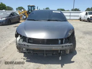 2015 Scion tC z VIN JTKJF5C76FJ010813, wystawiony jako Copart lot #58987575 z przebiegiem 108 709 mil mil oraz Szkoda całkowita • Salvage title. Historia ofert i sprzedaży dostępna na DreamBid. Obrazek 5.