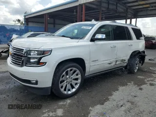 2017 Chevrolet Tahoe Premier with VIN 1GNSCCKC9HR363128, listed as a Copart auction lot 58798365 with 136,566 mi miles and Salvage title. Bid and sale history available at DreamBid. Image 1.