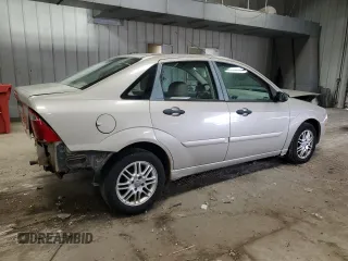 2007 Ford Focus S z VIN 1FAFP34N17W250616, wystawiony jako Copart lot #57055515 z przebiegiem 130 990 mil mil oraz Nie do naprawy • Non repairable. Historia ofert i sprzedaży dostępna na DreamBid. Obrazek 3.