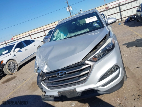 2016 Hyundai Tucson SE with VIN KM8J33A42GU238820, listed as a IAAI auction lot 41657093 with 47,319 mi miles. Bid and sale history available at carsss.com. Image 12.