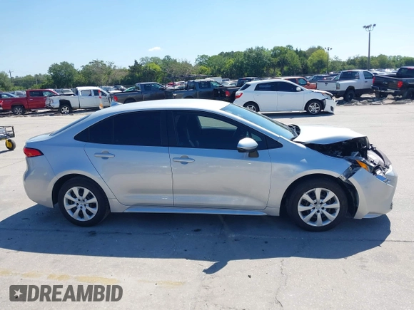 2023 Toyota Corolla LE with VIN 5YFB4MDE8PP053698, listed as a IAAI auction lot 42052631 with 26,766 mi miles. Bid and sale history available at carsss.com. Image 13.