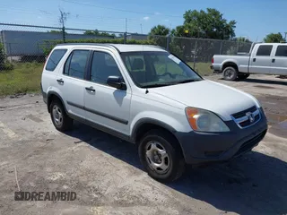 2002 Honda CR-V LX with VIN JHLRD684X2C010447, listed as a IAAI auction lot 42166268 with 233,336 mi miles and . Bid and sale history available at carsss.com. Image 1.