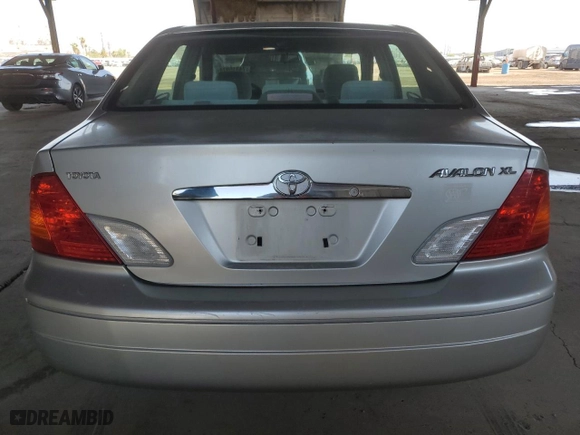 2001 Toyota Avalon XL w/Bucket Seats with VIN 4T1BF28B41U125324, listed as a Copart auction lot 74315974 with 173,786 mi miles and Salvage Title. Bid and sale history available at carsss.com. Image 6.