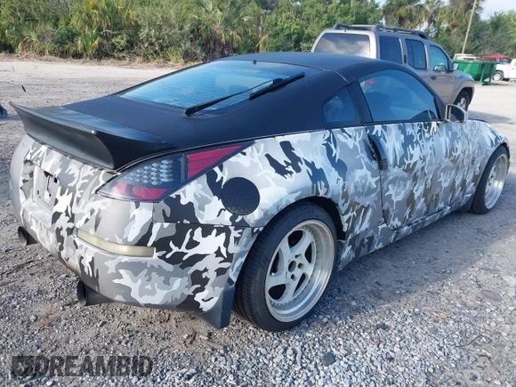 2004 Nissan 350Z Touring with VIN JN1AZ34D44T150578, listed as a IAAI auction lot 41907783 with 198,312 mi miles. Bid and sale history available at carsss.com. Image 4.