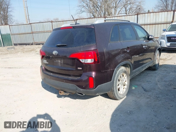 2014 Kia Sorento LX z VIN 5XYKT3A69EG499967, wystawiony jako IAAI lot #41790052 z przebiegiem 198 101 mil mil oraz . Historia ofert i sprzedaży dostępna na DreamBid. Obrazek 4.