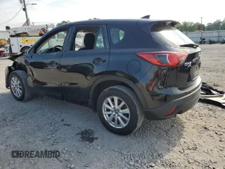 2016 Mazda CX-5 Sport with VIN JM3KE4BY6G0749973, listed as a Copart auction lot 54131635 with 97,480 mi miles and Salvage title. Bid and sale history available at DreamBid. Image 2.