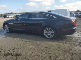 2016 Jaguar XJ Portfolio with VIN SAJWJ2GDXG8W03143, listed as a Copart auction lot 86467114 with 42,923 mi miles and Salvage title. Bid and sale history available at DreamBid. Image 2.