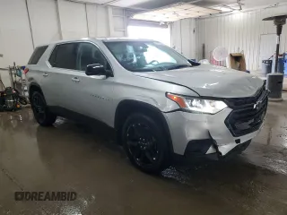 2020 Chevrolet Traverse LS with VIN 1GNERFKW1LJ130830, listed as a Copart auction lot 61297324 with 97,301 mi miles and Salvage Title. Bid and sale history available at carsss.com. Image 4.