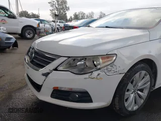 2009 Volkswagen CC Sport with VIN WVWML73C79E566020, listed as a IAAI auction lot 42140306 with 133,411 mi miles. Bid and sale history available at carsss.com. Image 6.