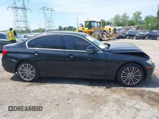 2015 BMW 3 Series 328i xDrive with VIN WBA3B3C57FF546250, listed as a IAAI auction lot 42214349 with 55,157 mi miles and . Bid and sale history available at DreamBid. Image 14.