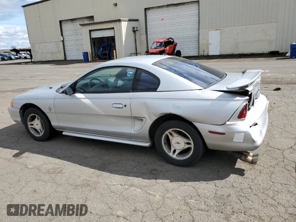 1998 Ford Mustang with VIN 1FAFP4041WF104623, listed as a Copart auction lot 50089825 with 189,313 mi miles and Salvage title. Bid and sale history available at DreamBid. Image 2.