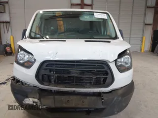 2019 Ford Transit z VIN 1FTYE1ZM4KKB38454, wystawiony jako IAAI lot #41599919 z przebiegiem 187 153 mil mil oraz . Historia ofert i sprzedaży dostępna na DreamBid. Obrazek 12.