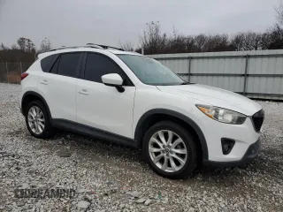 2014 Mazda CX-5 Grand Touring with VIN JM3KE4DY8E0301258, listed as a Copart auction lot 84248134 with 130,599 mi miles and Clean Title. Bid and sale history available at carsss.com. Image 4.