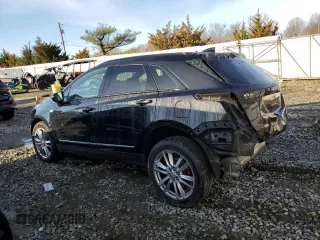2023 Cadillac XT5 AWD Sport with VIN 1GYKNGRS6PZ131182, listed as a Copart auction lot 49907105 with 38,734 mi miles and Salvage title. Bid and sale history available at DreamBid. Image 2.