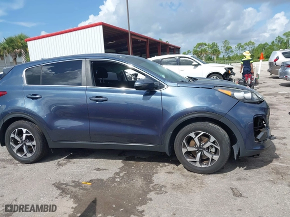 2020 Kia Sportage LX with VIN KNDPM3AC3L7713581, listed as a IAAI auction lot 40255286 with 90,221 mi miles. Bid and sale history available at carsss.com. Image 12.