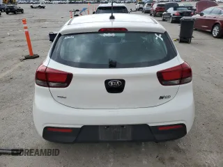 2018 Kia Rio LX with VIN 3KPA25AB6JE089609, listed as a Copart auction lot 51663975 with 130,697 mi miles and Salvage Title. Bid and sale history available at DreamBid. Image 6.