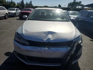 2012 Volkswagen Jetta SEL with VIN 3VWLP7AJ6CM324271, listed as a Copart auction lot 59986855 with 129,002 mi miles and Salvage title. Bid and sale history available at DreamBid. Image 5.