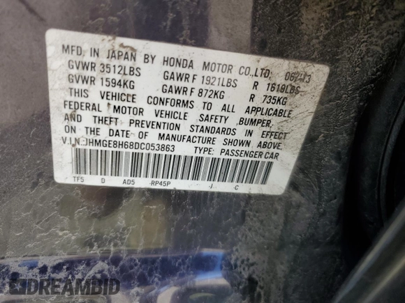 2013 Honda Fit Sport z VIN JHMGE8H68DC053863, wystawiony jako Copart lot #52140945 z przebiegiem Nie podano mil oraz Szkoda całkowita • Salvage title. Historia ofert i sprzedaży dostępna na DreamBid. Obrazek 13.