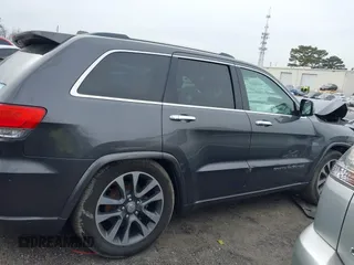 2017 Jeep Grand Cherokee Overland with VIN 1C4RJFCG8HC772837, listed as a IAAI auction lot 41304895 with 71,338 mi miles. Bid and sale history available at carsss.com. Image 12.