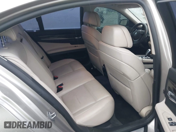 2012 BMW 7 Series 750i with VIN WBAKA8C50CDX01319, listed as a IAAI auction lot 42133359 with 168,986 mi miles and . Bid and sale history available at DreamBid. Image 8.
