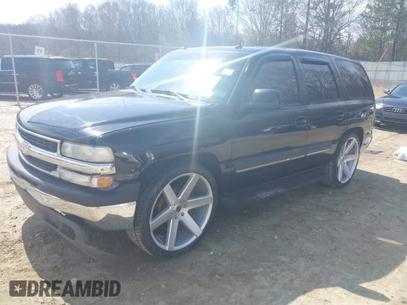 2003 Chevrolet Tahoe LT with VIN 1GNEC13Z73J322783, listed as a IAAI auction lot 41773868 with 259,710 mi miles and . Bid and sale history available at DreamBid. Image 2.