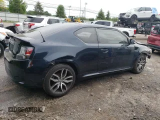 2016 Scion tC z VIN JTKJF5C77GJ020445, wystawiony jako Copart lot #58359755 z przebiegiem 104 576 mil mil oraz Tytuł czysty. Historia ofert i sprzedaży dostępna na DreamBid. Obrazek 3.