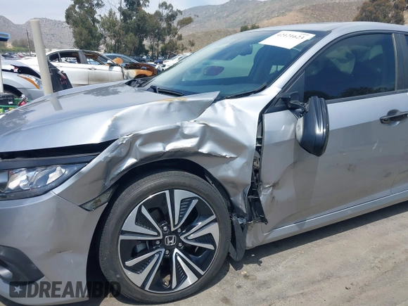 2018 Honda Civic EX-L z VIN JHMFC1F79JX037843, wystawiony jako IAAI lot #42121623 z przebiegiem 49 759 mil mil oraz . Historia ofert i sprzedaży dostępna na DreamBid. Obrazek 18.