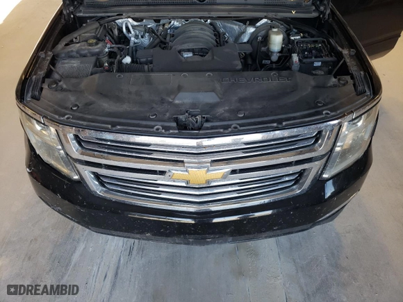 2015 Chevrolet Suburban LTZ with VIN 1GNSCKKC3FR291995, listed as a Copart auction lot 65895214 with 153,672 mi miles and Salvage Title. Bid and sale history available at carsss.com. Image 13.