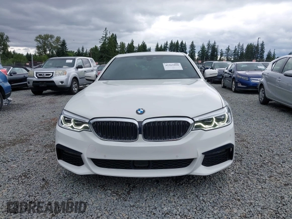 2019 BMW 5 Series 530e with VIN WBAJA9C57KB389401, listed as a IAAI auction lot 42565098 with 52,343 mi miles and . Bid and sale history available at DreamBid. Image 13.