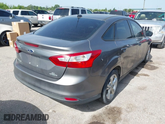 2013 Ford Focus SE with VIN 1FADP3F23DL131327, listed as a IAAI auction lot 42577474 with 146,412 mi miles and . Bid and sale history available at DreamBid. Image 4.
