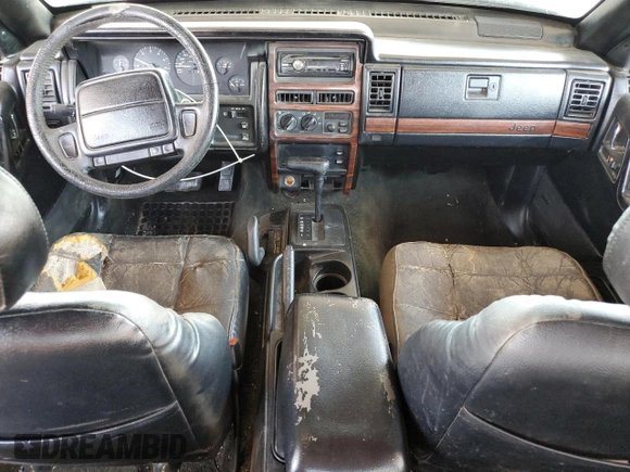 1994 Jeep Grand Cherokee Limited with VIN 1J4GZ78S5RC304501, listed as a Copart auction lot 64632335 with 184,333 mi miles and Salvage title. Bid and sale history available at DreamBid. Image 8.