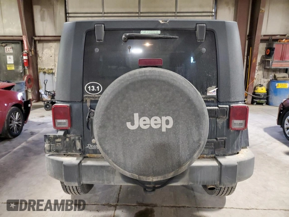 2007 Jeep Wrangler Sahara with VIN 1J4FA54127L127598, listed as a Copart auction lot 44049475 with 222,867 mi miles and Salvage title. Bid and sale history available at DreamBid. Image 6.