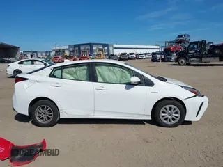 2021 Toyota Prius L Eco with VIN JTDKAMFU2M3147562, listed as a IAAI auction lot 41882066 with 99,491 mi miles. Bid and sale history available at carsss.com. Image 13.