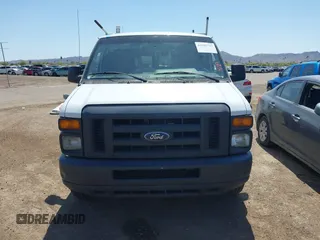 2014 Ford Econoline Cargo Commercial with VIN 1FTNE1EW3EDA92098, listed as a IAAI auction lot 41985717 with 236,117 mi miles and . Bid and sale history available at DreamBid. Image 12.