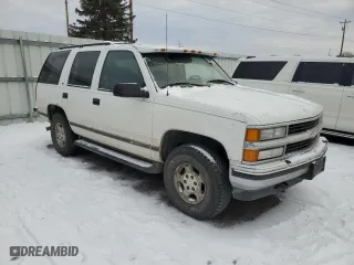 1997 Chevrolet Tahoe with VIN 1GNEK13R7VJ362707, listed as a Copart auction lot 43449635 with 198,516 mi miles and Salvage Title. Bid and sale history available at carsss.com. Image 4.