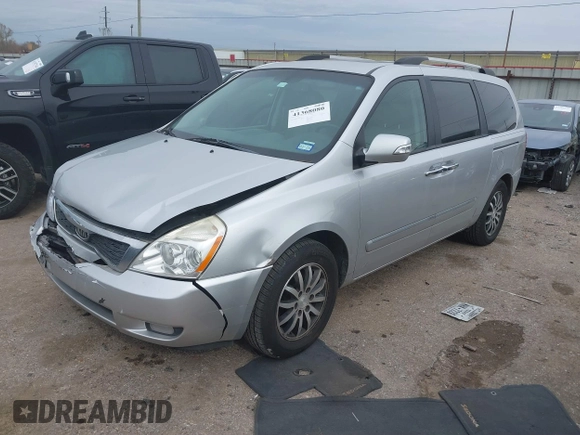 2012 Kia Sedona EX with VIN KNDMH4C74C6497243, listed as a IAAI auction lot 41368080 with 218,806 mi miles. Bid and sale history available at carsss.com. Image 2.
