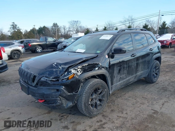 2022 Jeep Cherokee Trailhawk with VIN 1C4PJMBX7ND508267, listed as a IAAI auction lot 41356773 with 74,019 mi miles. Bid and sale history available at carsss.com. Image 2.