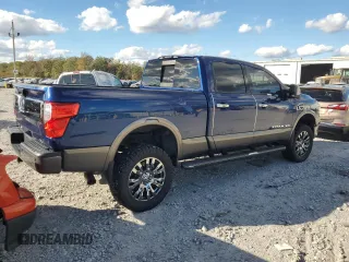 2016 Nissan Titan XD Platinum Reserve with VIN 1N6BA1F46GN512586, listed as a Copart auction lot 82406194 with 115,666 mi miles and Salvage Title. Bid and sale history available at carsss.com. Image 4.
