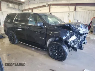 2023 Chevrolet Tahoe LT with VIN 1GNSKNKD0PR196082, listed as a Copart auction lot 45707215 with 35,736 mi miles and Salvage title. Bid and sale history available at DreamBid. Image 4.