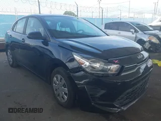 2023 Kia Rio S z VIN 3KPA24AD2PE549143, wystawiony jako IAAI lot #41760539 z przebiegiem 26 227 mil mil oraz . Historia ofert i sprzedaży dostępna na DreamBid. Obrazek 1.