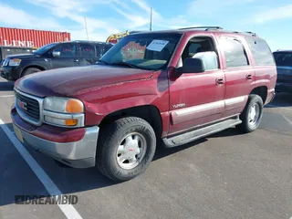 2001 GMC Yukon SLT with VIN 1GKEK13T71J173316, listed as a IAAI auction lot 41362648 with 276,222 mi miles. Bid and sale history available at carsss.com. Image 2.